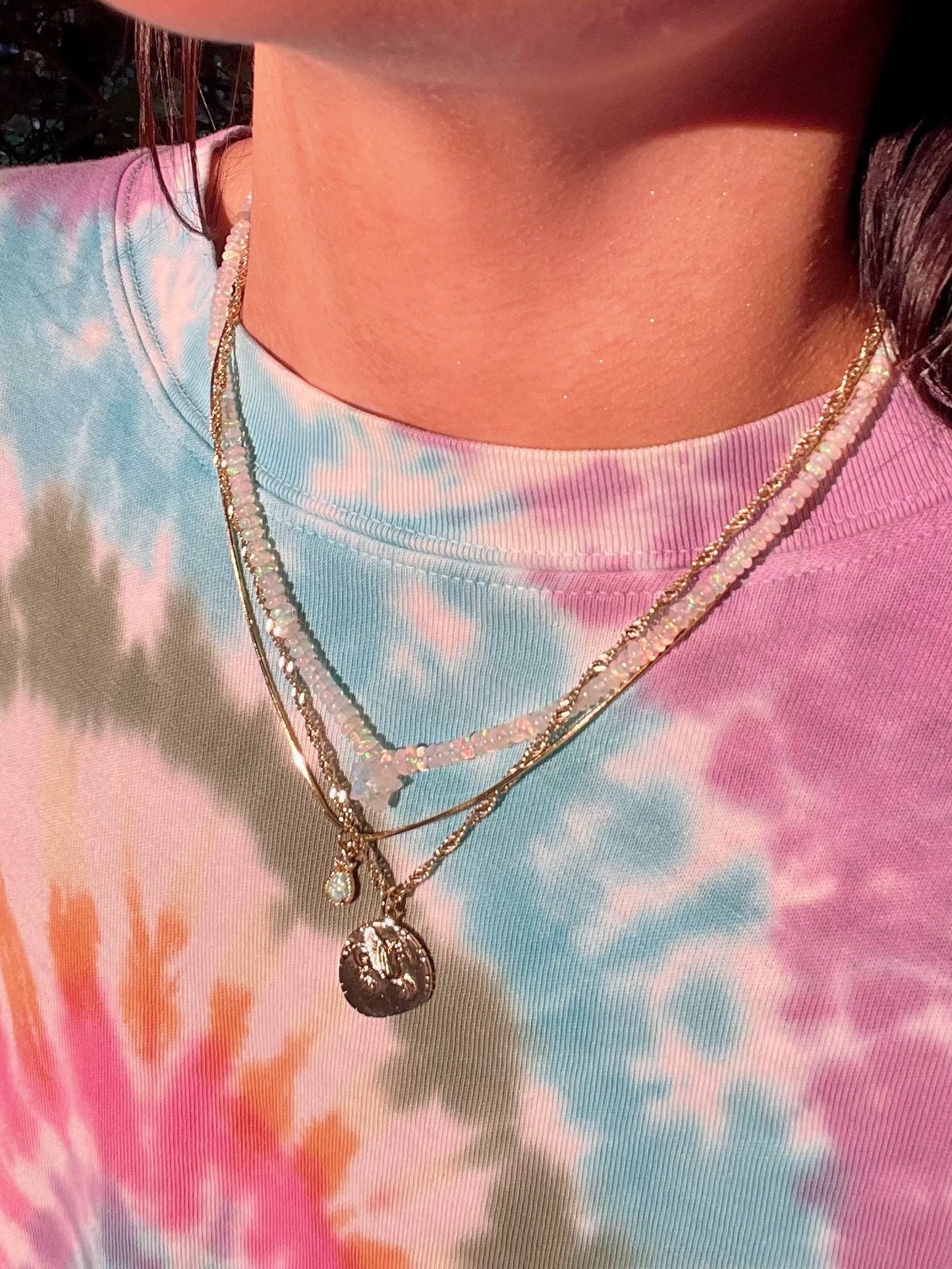 It Girl Piece de Resistance - Graduated Opal Strand with Star Cut Center Opal